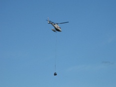 Helicopter Carrying out Hunters and Supplies.JPG